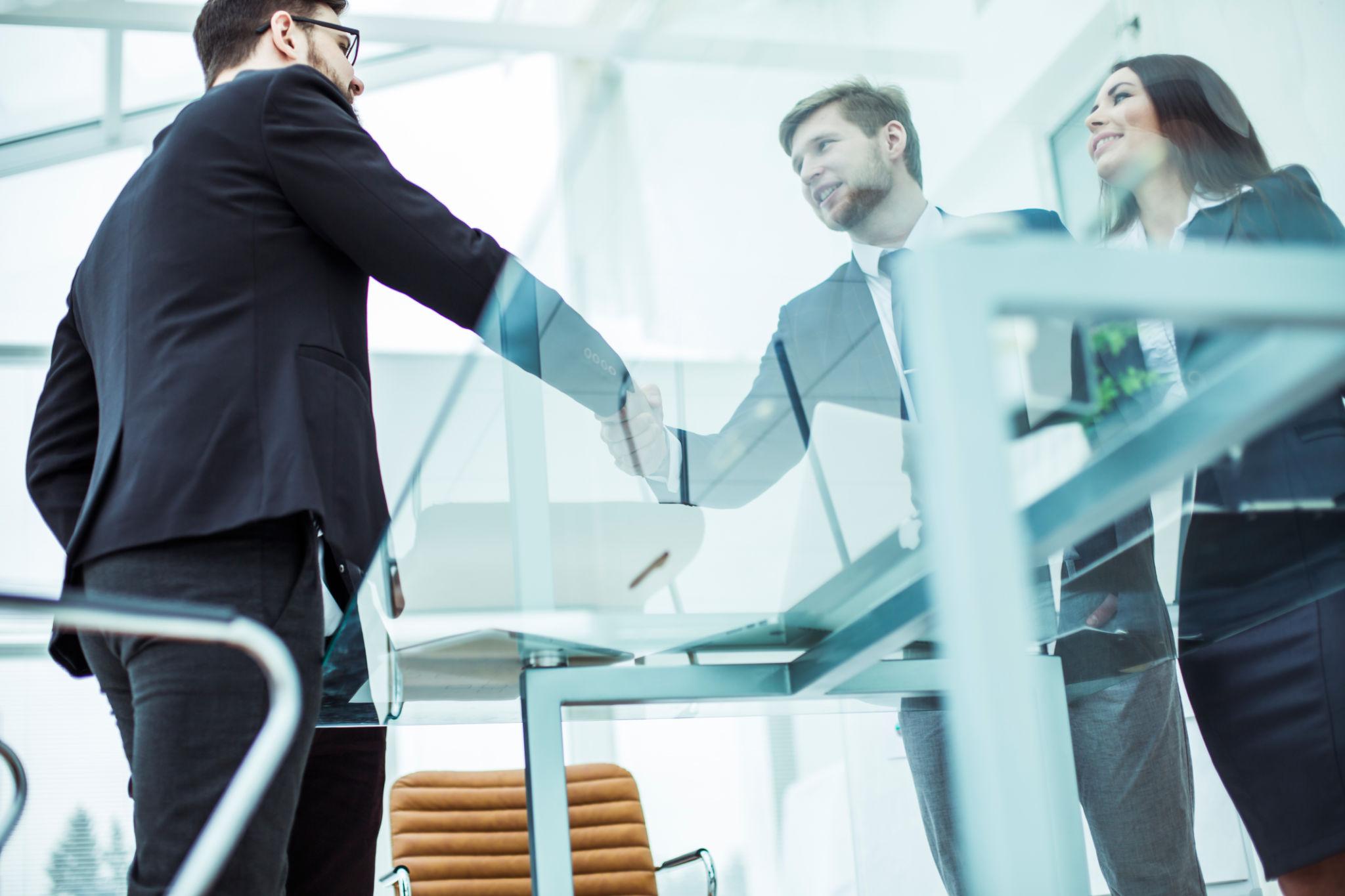 Business handshake meeting